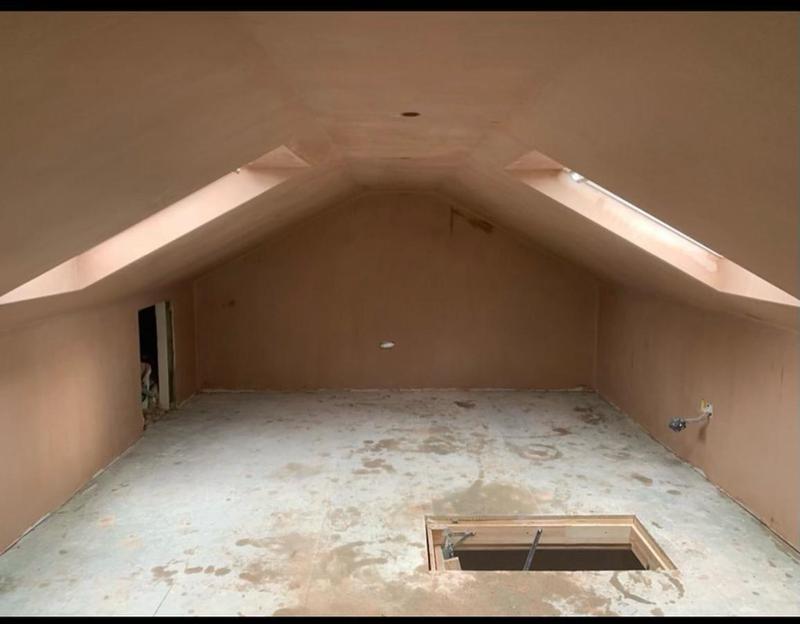 A picture of an attic that has been replastered by Ard Plasterers in Nottingham