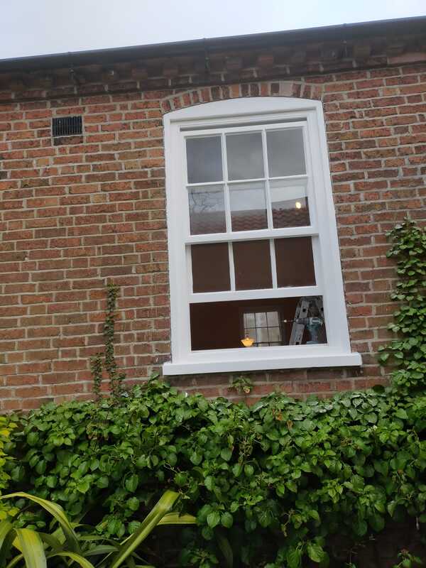 A picture of a newly painted window colour is  brilliant white done by Painters and Decorators Nottingham